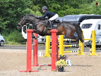 Aimee Paxton returned triumphant in the NAF Five Star Summer Bronze League Qualifier at Muirmill Equestrian Centre 